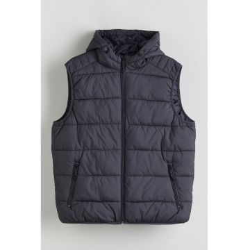 Vesta matlasata cu buzunare cu fermoar