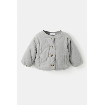 Jacheta matlasata cu buzunare oblice